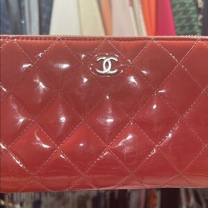 CHANEL Quilted Patent Leather wallet in Glossy Red with Silver CC